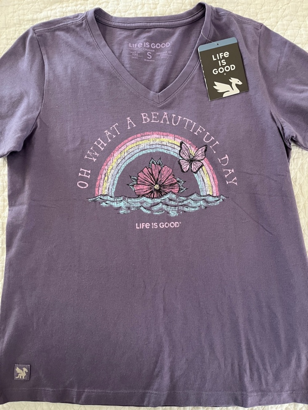 Life Is Good Lavender V‑Neck Tee with Pastel Rainbow & Floral Graphic